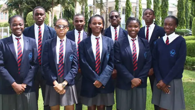 High school learners standing together in school uniform