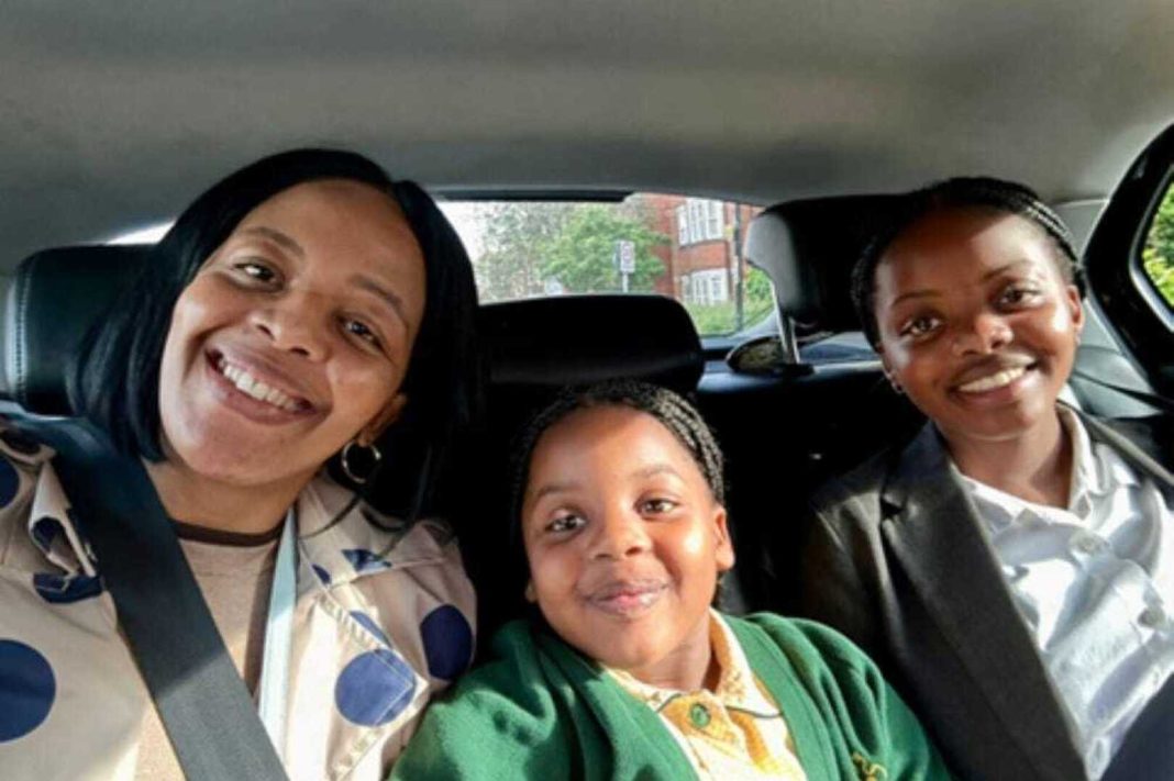 Nothabo Zandile Tshuma pictured in a car with her daughters, Natalie and Nala
