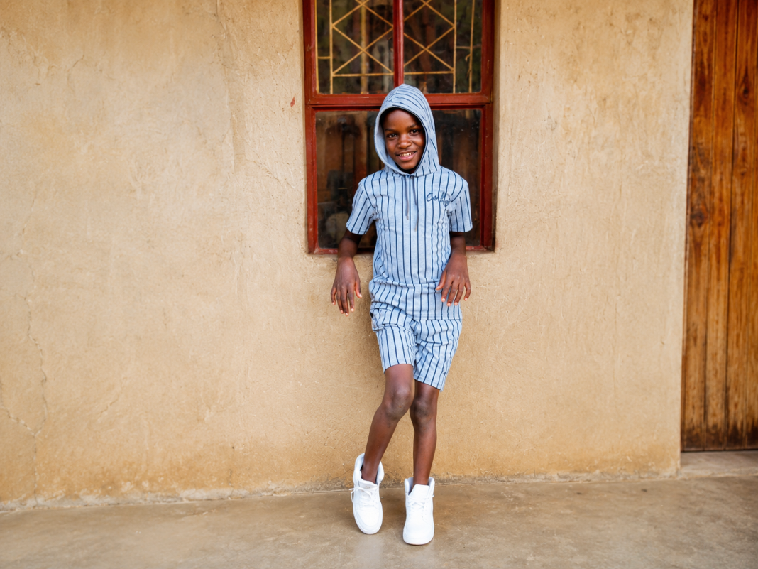 Buhera boy with disability Newton standing outside his grandmother’s home